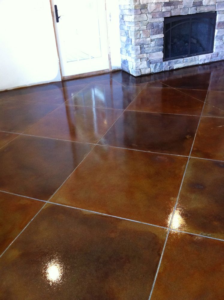 Scoring Lines in a Multi Colored Stained Concrete Floor 